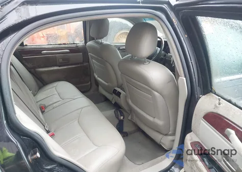 2004 Lincoln Town Car Ultimate из США, поврежденный, VIN 1LNHM83W64Y657300